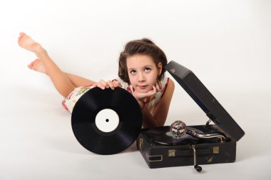 Girl with a gramophone and records clipart