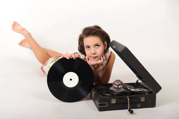 stock image Girl with a gramophone and records