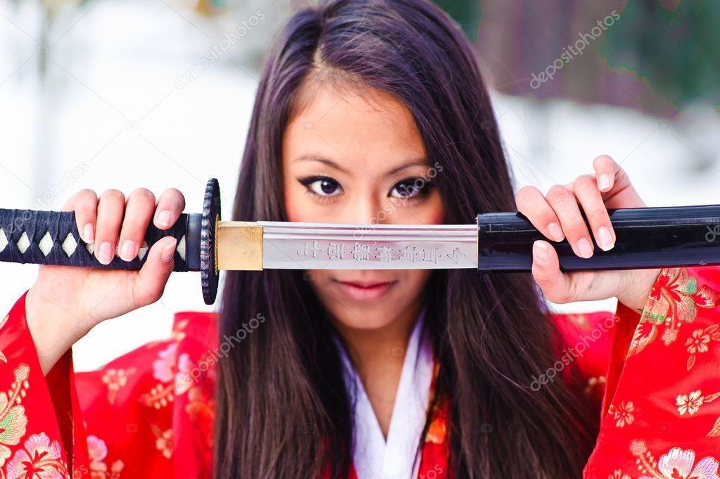 Girl with a katana — Stock Photo © evdoha #4940181