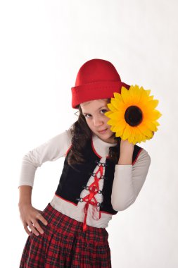 Girl in red hat with sunflowers in their hands clipart