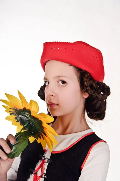 红色帽子用向日葵在他们手中的女孩 — 图库照片