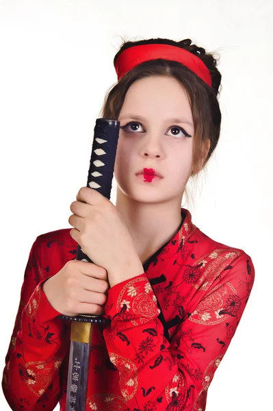 Una ragazza che maneggia una lunga spada samurai — Foto Stock