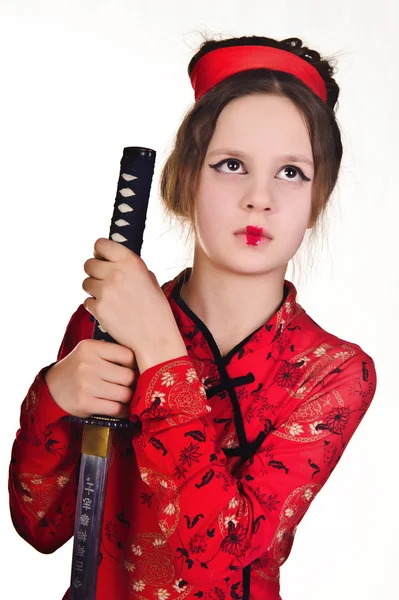 Ένα κορίτσι που χειρίζεται ένα σπαθί Σαμουράι μακρά — Φωτογραφία Αρχείου