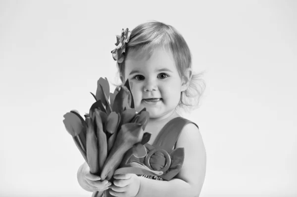 Chica con montón de tulipanes — Foto de Stock