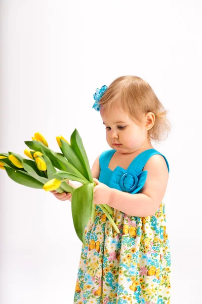 Girl with bunch of tulips — Stock Photo, Image
