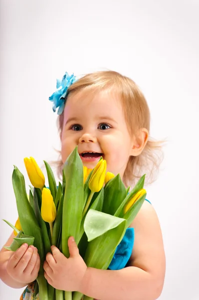 Ragazza con mazzo di tulipani — Foto Stock