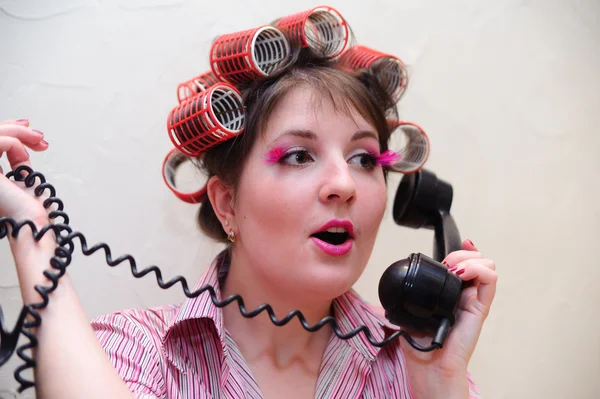 Housewife with curlers — Stock Photo, Image