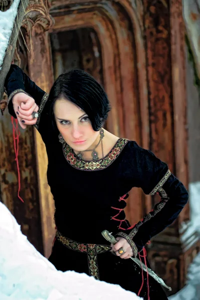 Mädchen in einem mittelalterlichen Kleid — Stockfoto