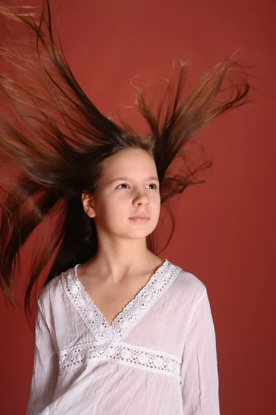 Dynamic portrait of beautiful young brunette girl — Stock Photo, Image