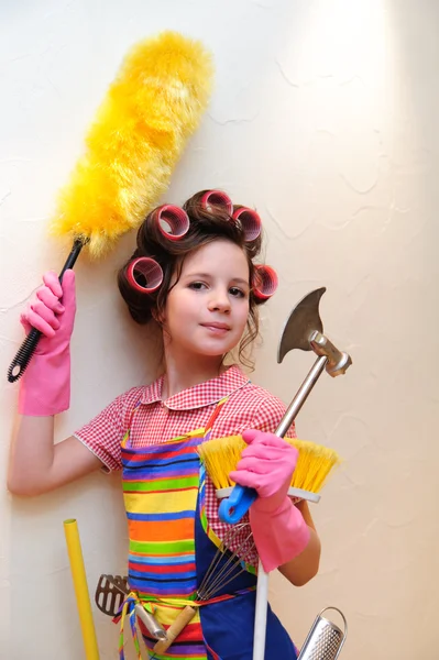A young housewife with brushes — Stock Photo, Image