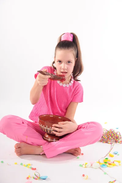 Girl eating jam — Stock Photo, Image