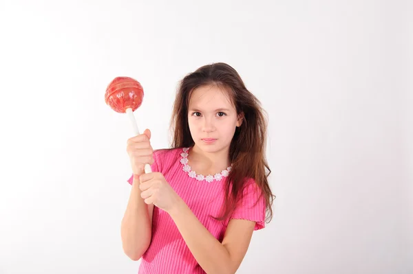 Vacker flicka med stora lollipop — Stockfoto