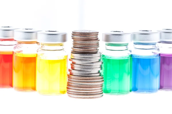 Comment votre pile de pièces de monnaie jusqu'à des médicaments ? Obtenez la valeur de votre argent ! Images De Stock Libres De Droits