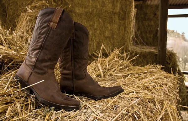 Boots and hay — Stock Photo, Image