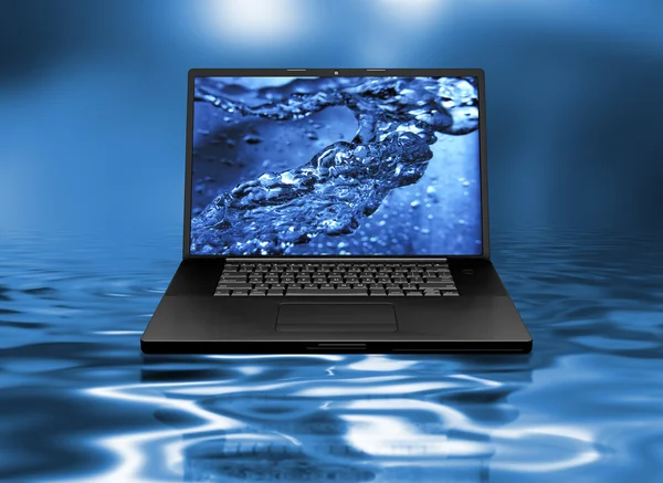 stock image Laptop on water