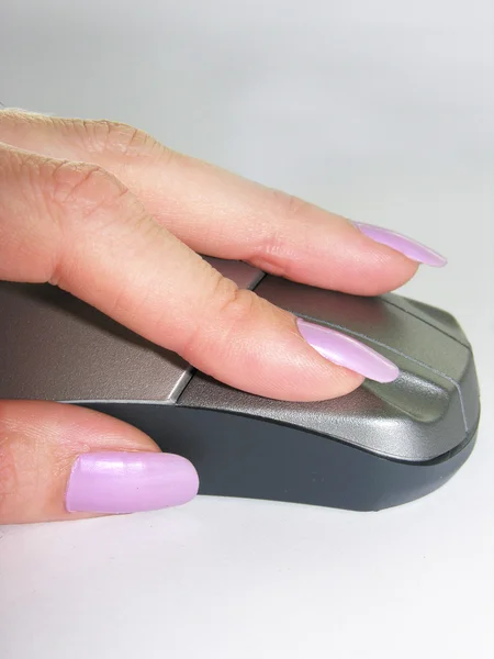 stock image Hand holding a wireless computer mouse
