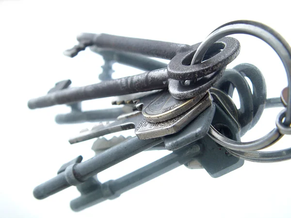 Old keys on glass — Stock Photo, Image