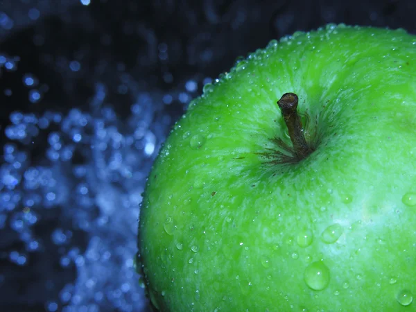 Apple with moisture droplets — Stock Photo, Image