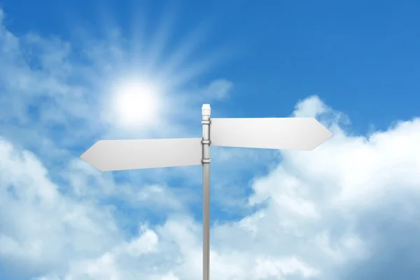 Signpost against blue sky — Stock Photo, Image