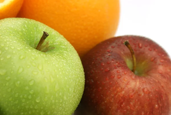 Jablka a pomeranče — Stock fotografie