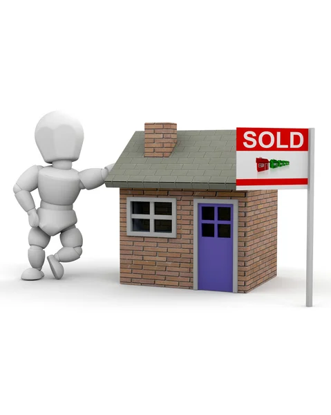 Man met huis en verkocht teken — Stockfoto