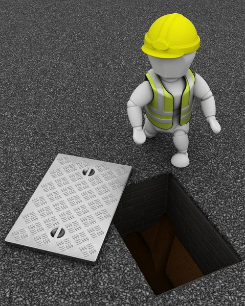 Constructeur inspectant les drains à travers le couvercle de trou d'homme — Photo