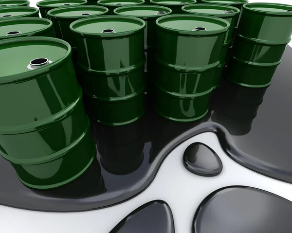 Tambores de petróleo sentados en aceite derramado — Foto de Stock