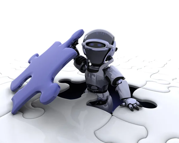 Robô com a peça final do quebra-cabeça — Fotografia de Stock