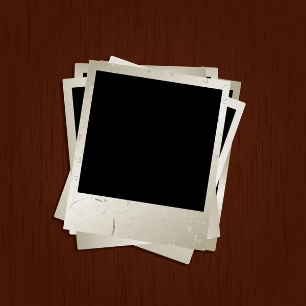 Blank photos on wooden background — Stock Photo, Image