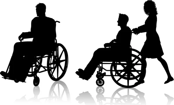 Mężczyzna i kobieta z wózka inwalidzkiego — Zdjęcie stockowe