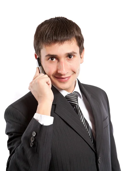 Businessman speaks on phone — Stock Photo, Image