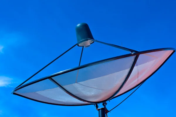Satellite dish in blue sky — Stock Photo, Image