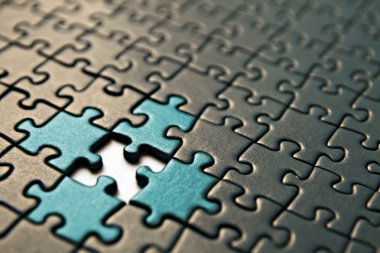 Puzzle connection. Finding the missing part of the puzzle clipart