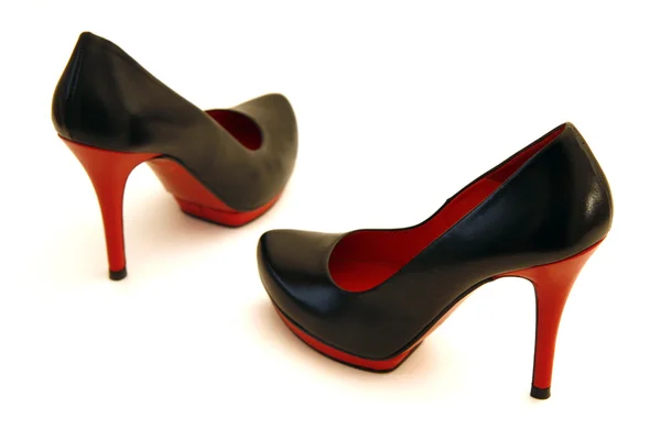 Vysoké boty na podpatku v červené a černé — Stock fotografie