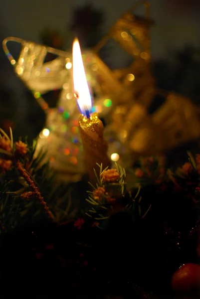Lighted christmas candle — Stock Photo, Image