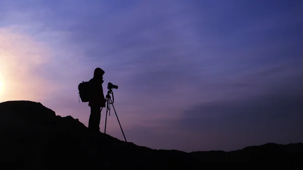 Photographer at sunrise — Stock Photo, Image