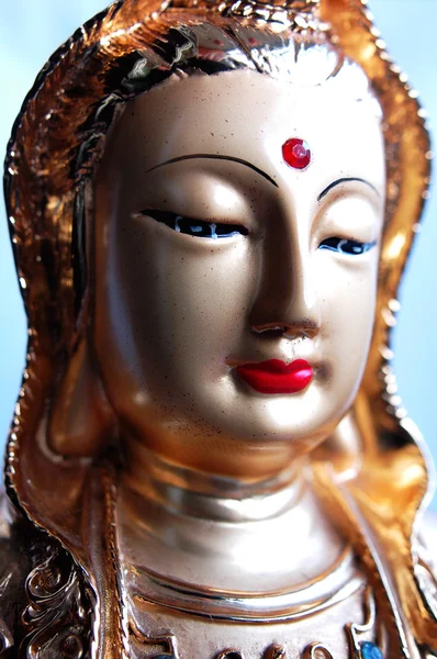 Närbild bild av en gyllene buddha-staty — Stockfoto