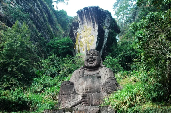 Statue des lächelnden Buddha — Stockfoto