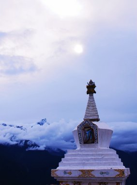 White stupa under the sun clipart