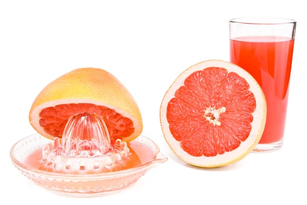 Juicer, cut a grapefruit and a glass of juice. — Stock Photo, Image