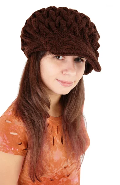 Dívka v čepici na bílém pozadí — Stock fotografie