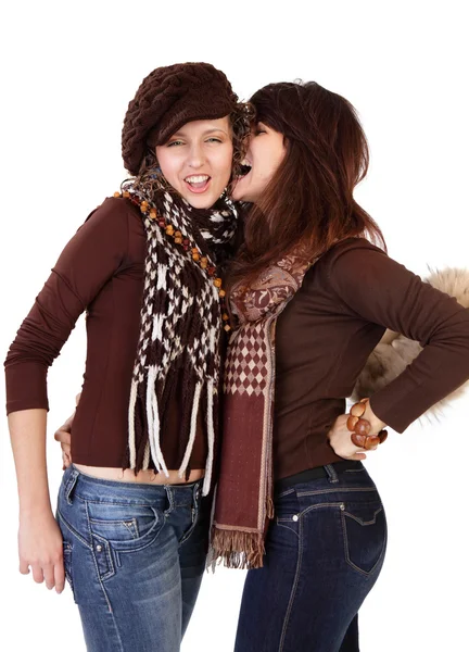 Duas jovens namoradas felizes falando isolado sobre branco — Fotografia de Stock