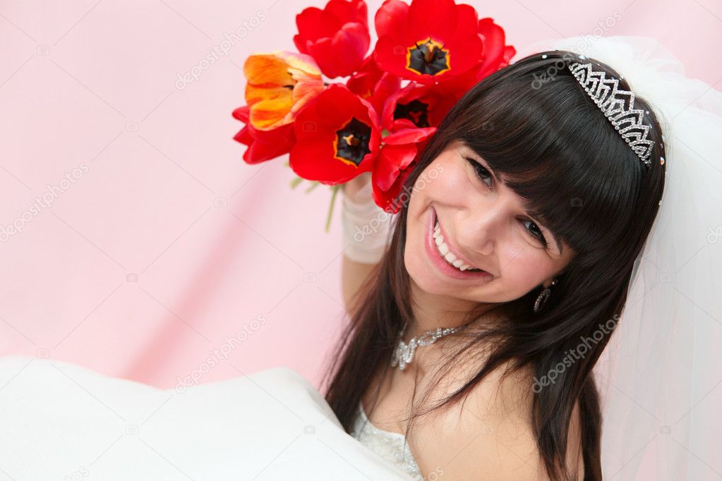 Smiling bride with tulips