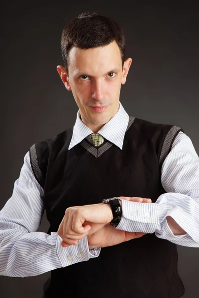 Businessman looking on his watch — Stock Photo, Image