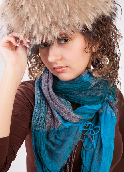 Pretty girl in a fur hat — Stock Photo, Image