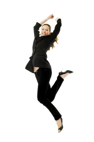 Молодая предпринимательница прыгает на белом фоне студии — стоковое фото