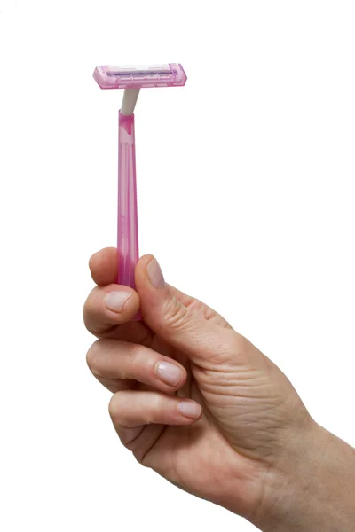 Hand holding a disposable razor
