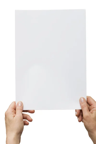 Hände, die ein weißes Blatt Papier halten — Stockfoto