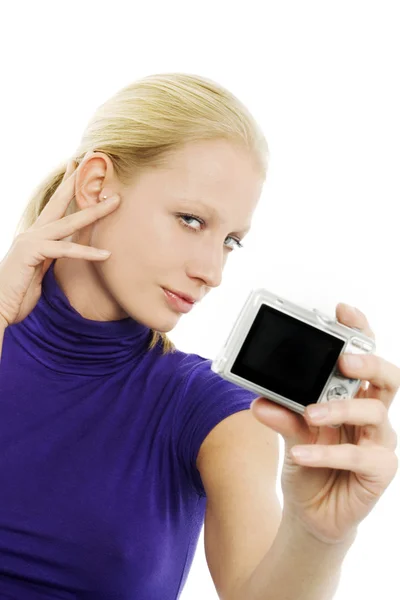 Portrait of a young caucasian woman making a self portrait with a digital c — Stock Photo, Image