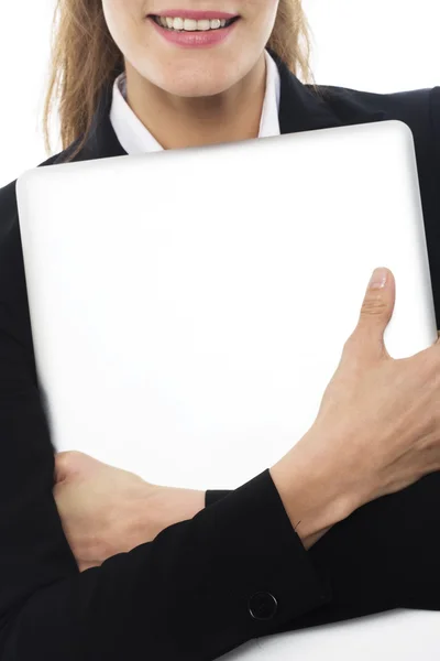 Jovem empresária com laptop em braços no estúdio de fundo branco — Fotografia de Stock
